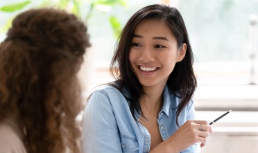 Two women talk