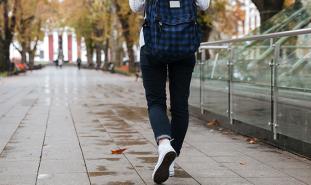 student with backpack