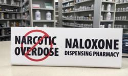 Sign that read Naloxone Dispensing Pharmacy